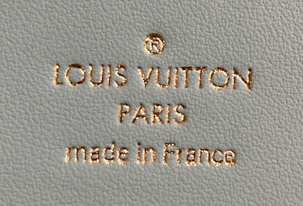 Capucines Vertical Wallet Leather