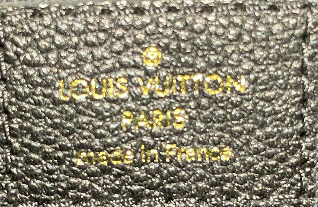 Daily Pouch Monogram Empreinte Leather