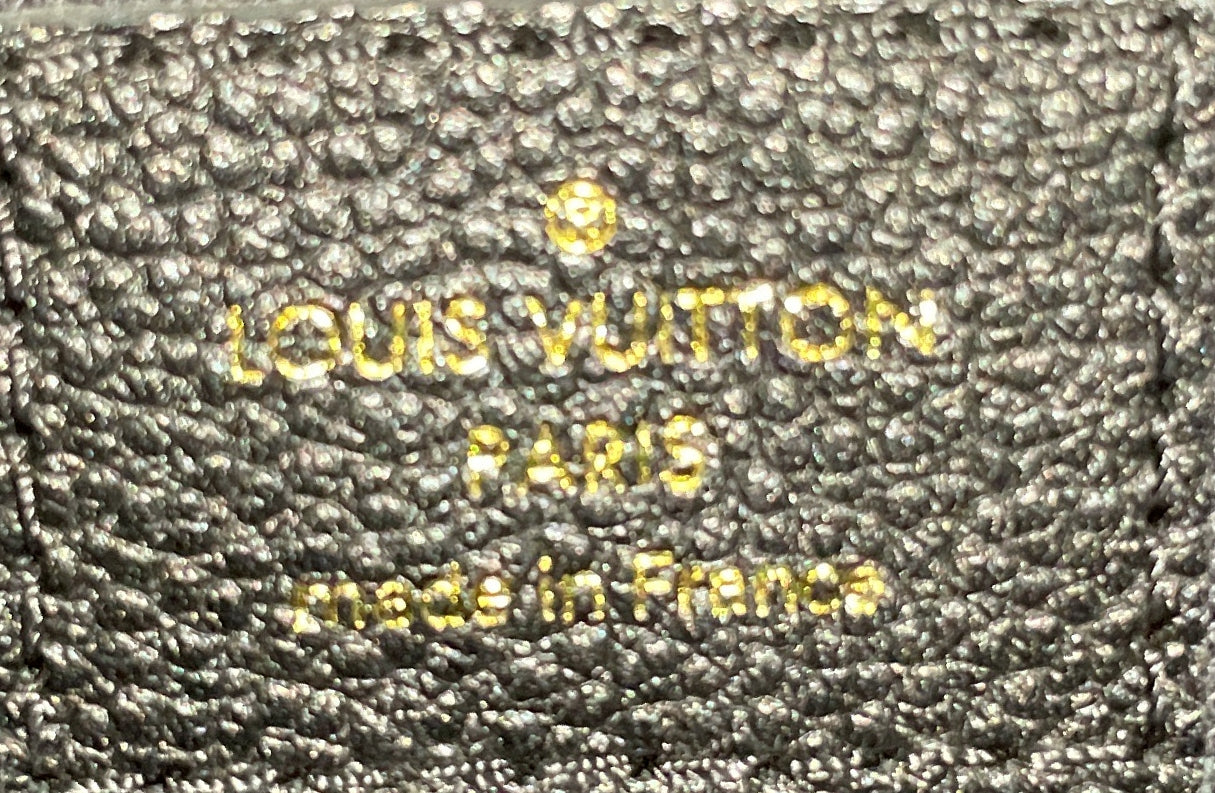 Daily Pouch Monogram Empreinte Leather