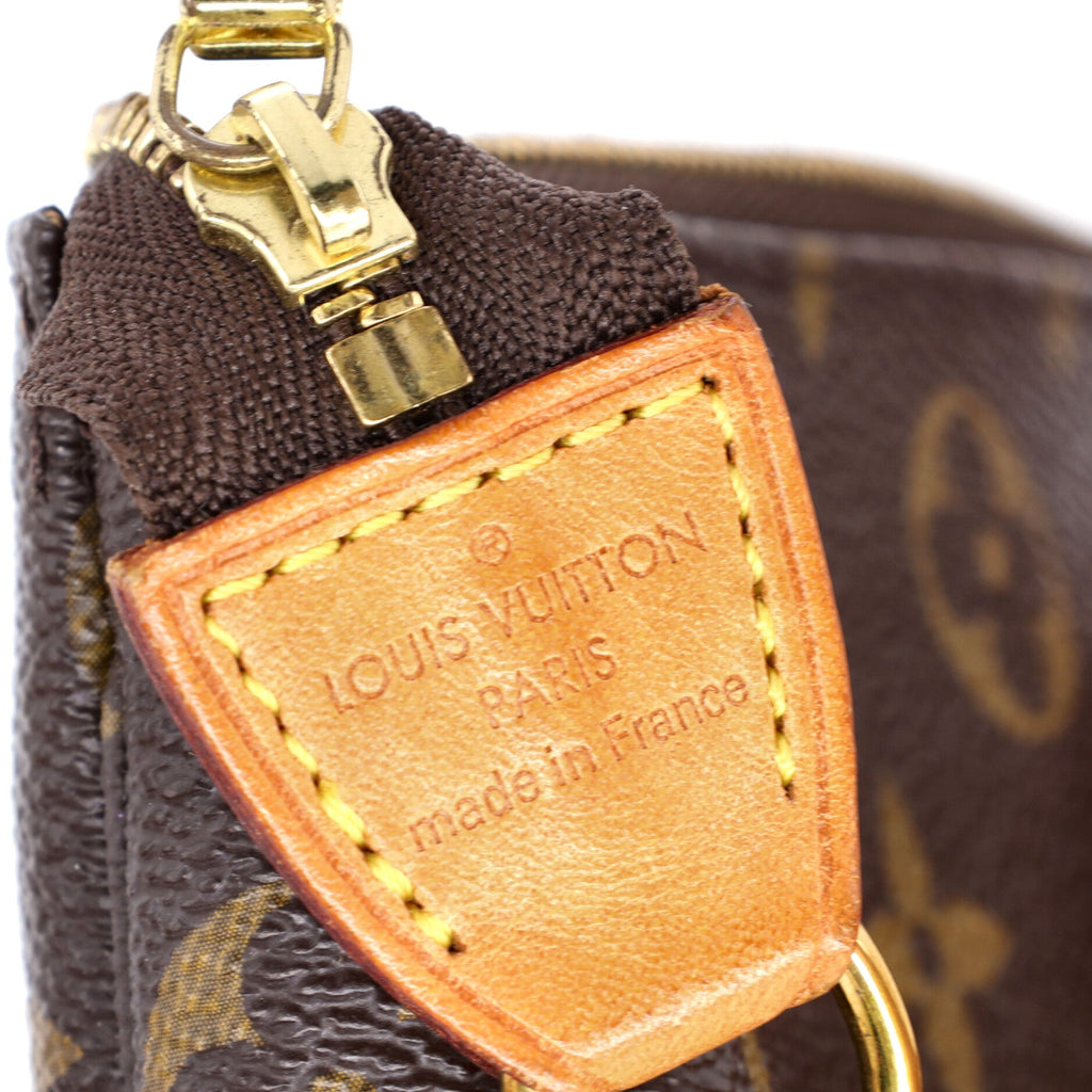 Pochette Accessoires Monogram Canvas Mini