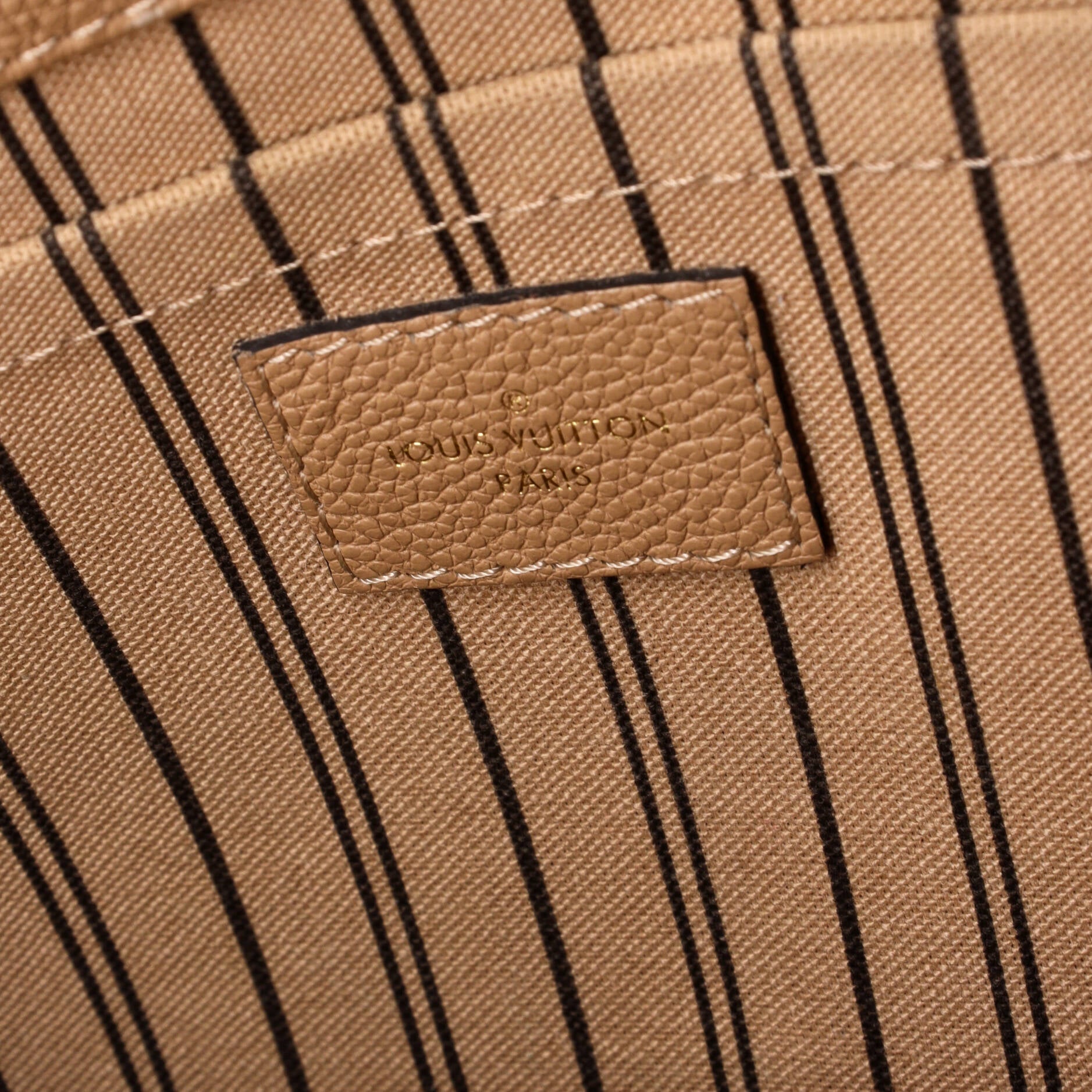 Montaigne Handbag Monogram Empreinte Leather MM