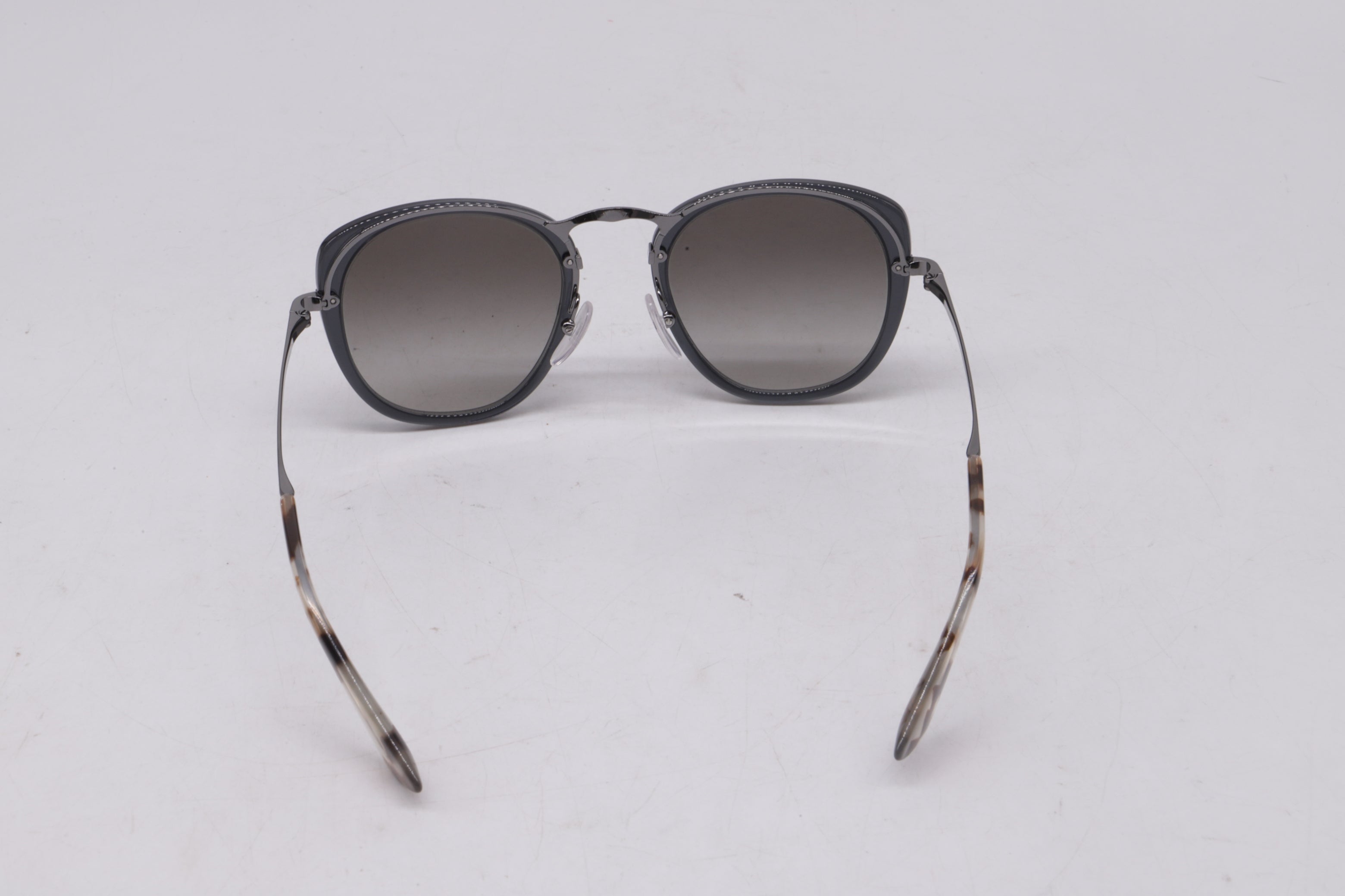 Prada Catwalk SPR58U Oval Sunglasses in Grey Metal