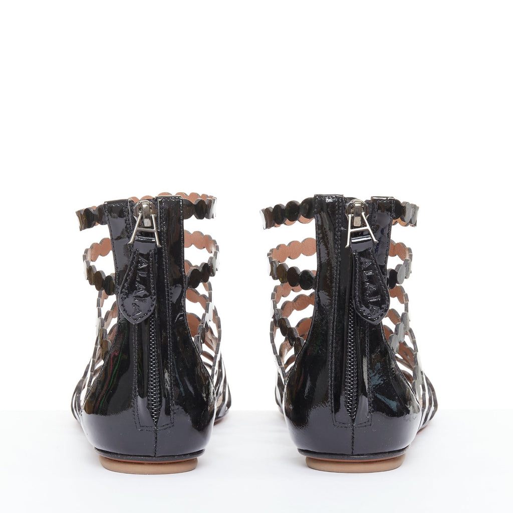 Women's Alaia Patent Scalloped Cage Sandals