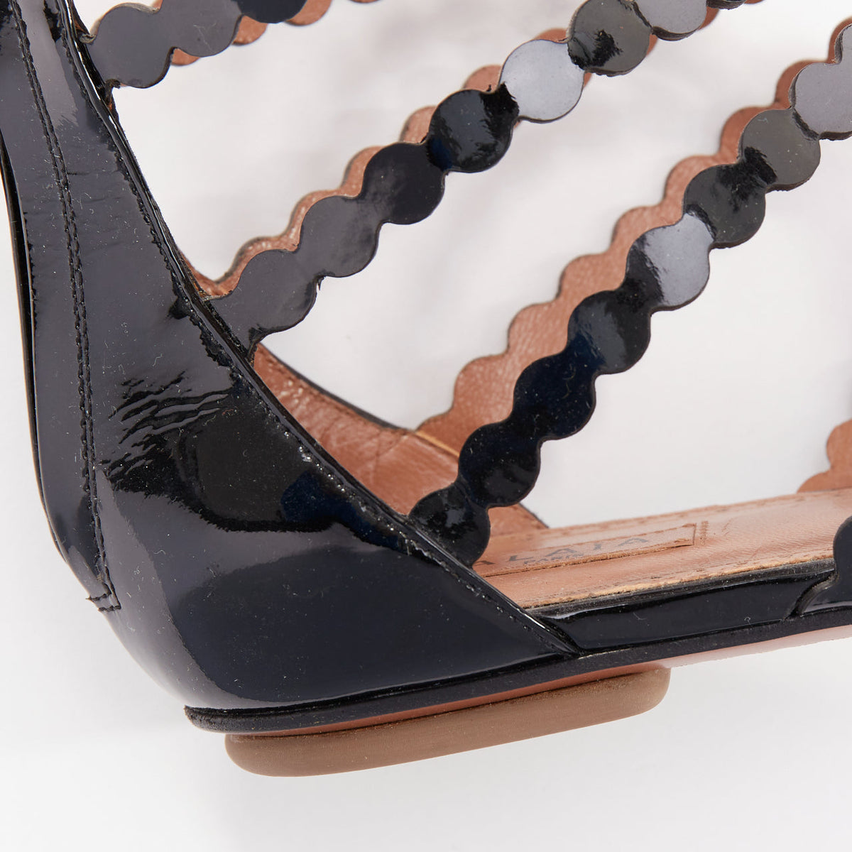 Women's Alaia Patent Scalloped Cage Sandals