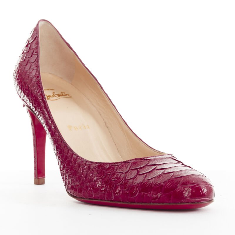Women's Christian Louboutin Leather Round Toe Pumps