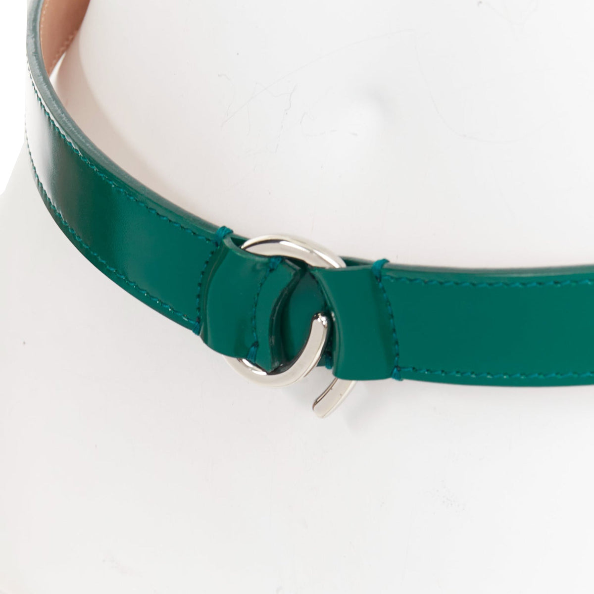 Alaia leather silver swirl loop hook skinny belt
