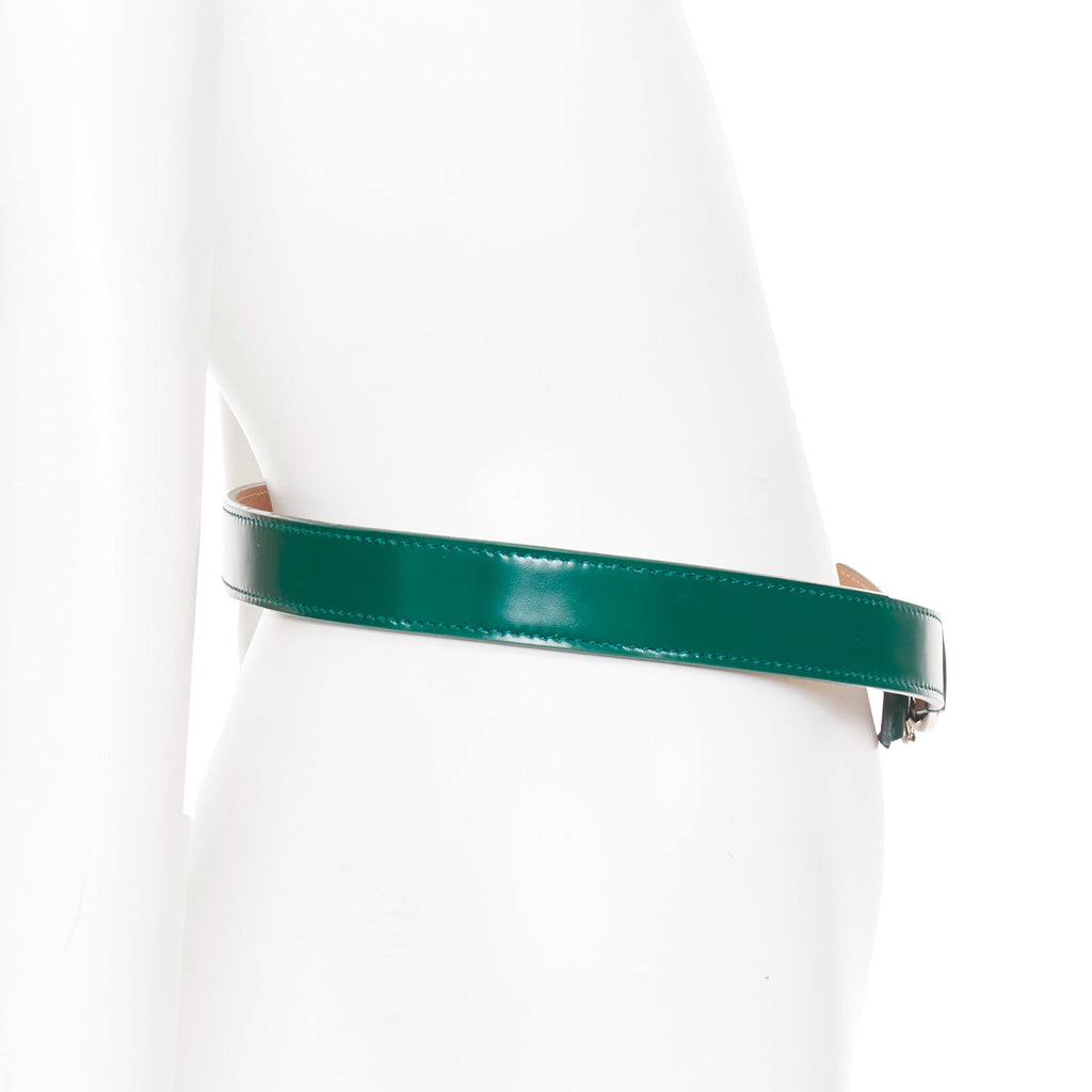 Alaia leather silver swirl loop hook skinny belt