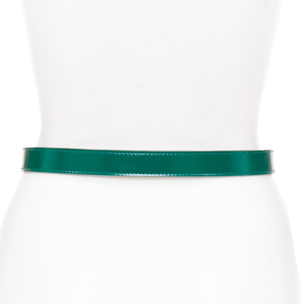 Alaia leather silver swirl loop hook skinny belt