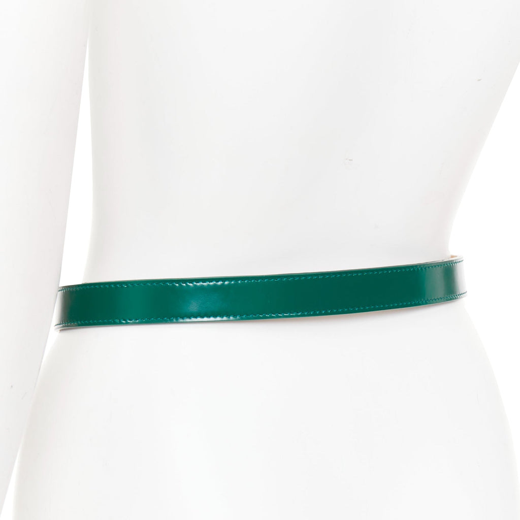 Alaia leather silver swirl loop hook skinny belt