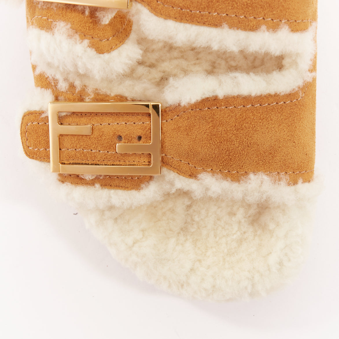 Women's Fendi Feel suede shearling gold FF buckle sandal slides