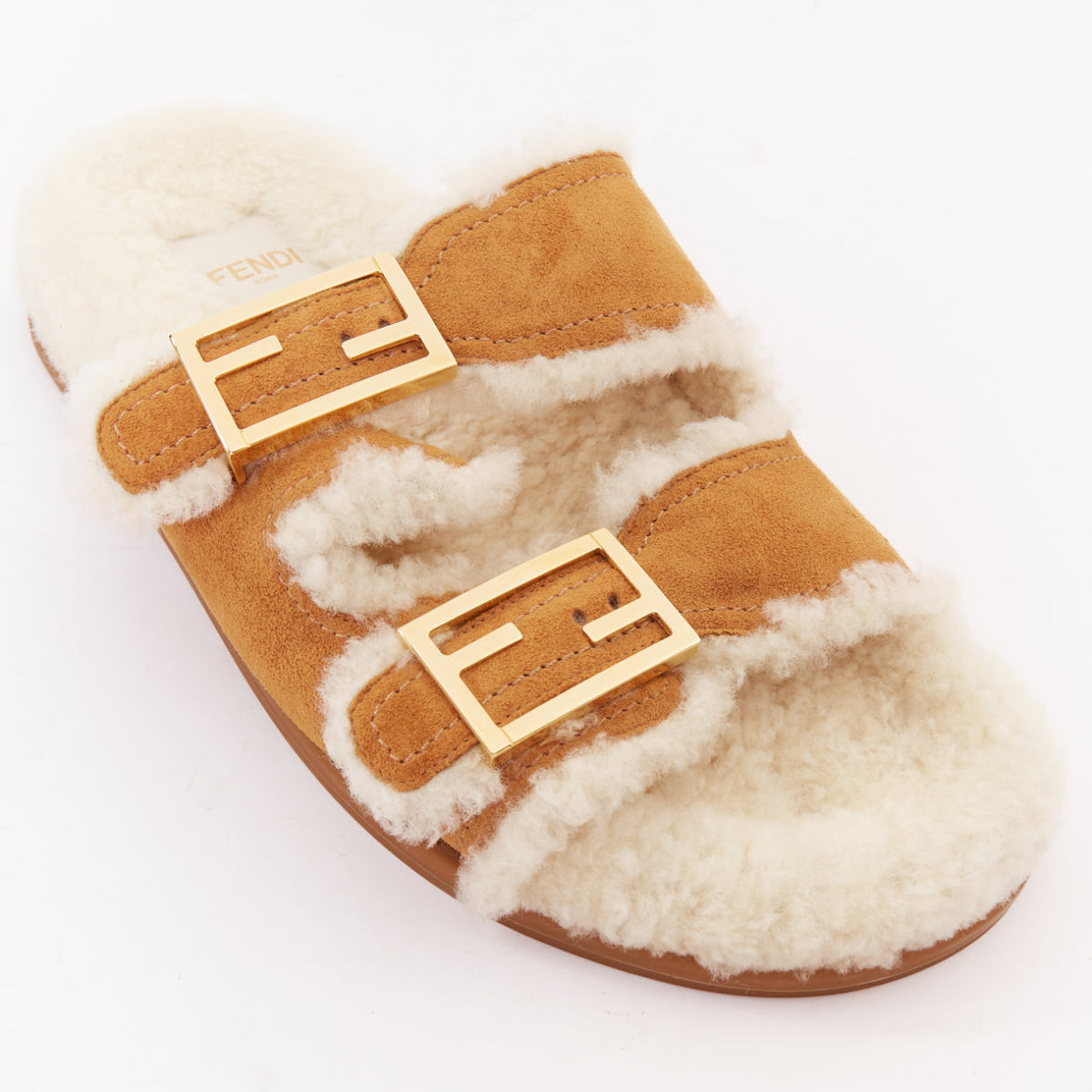 Women's Fendi Feel suede shearling gold FF buckle sandal slides