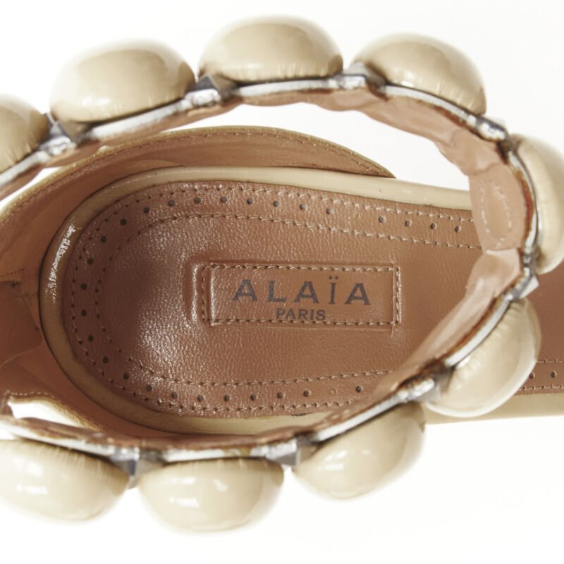 Women's Alaia La Bombe ball embellished studded patent sandal