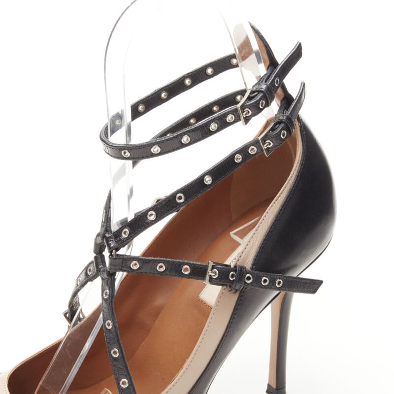 Women's Valentino leather silver grommet stud bondage harness pump