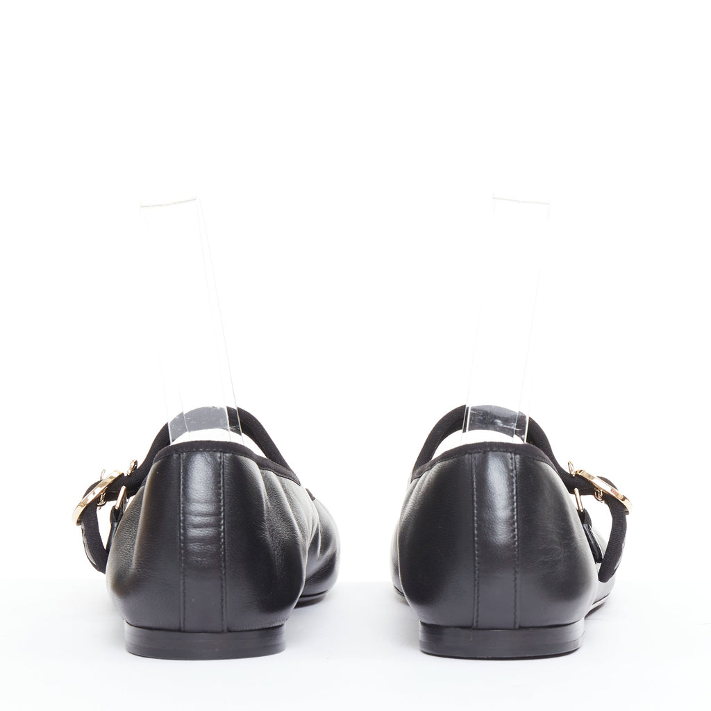 Women's Chanel black soft lambskin stitched CC cap toe flats