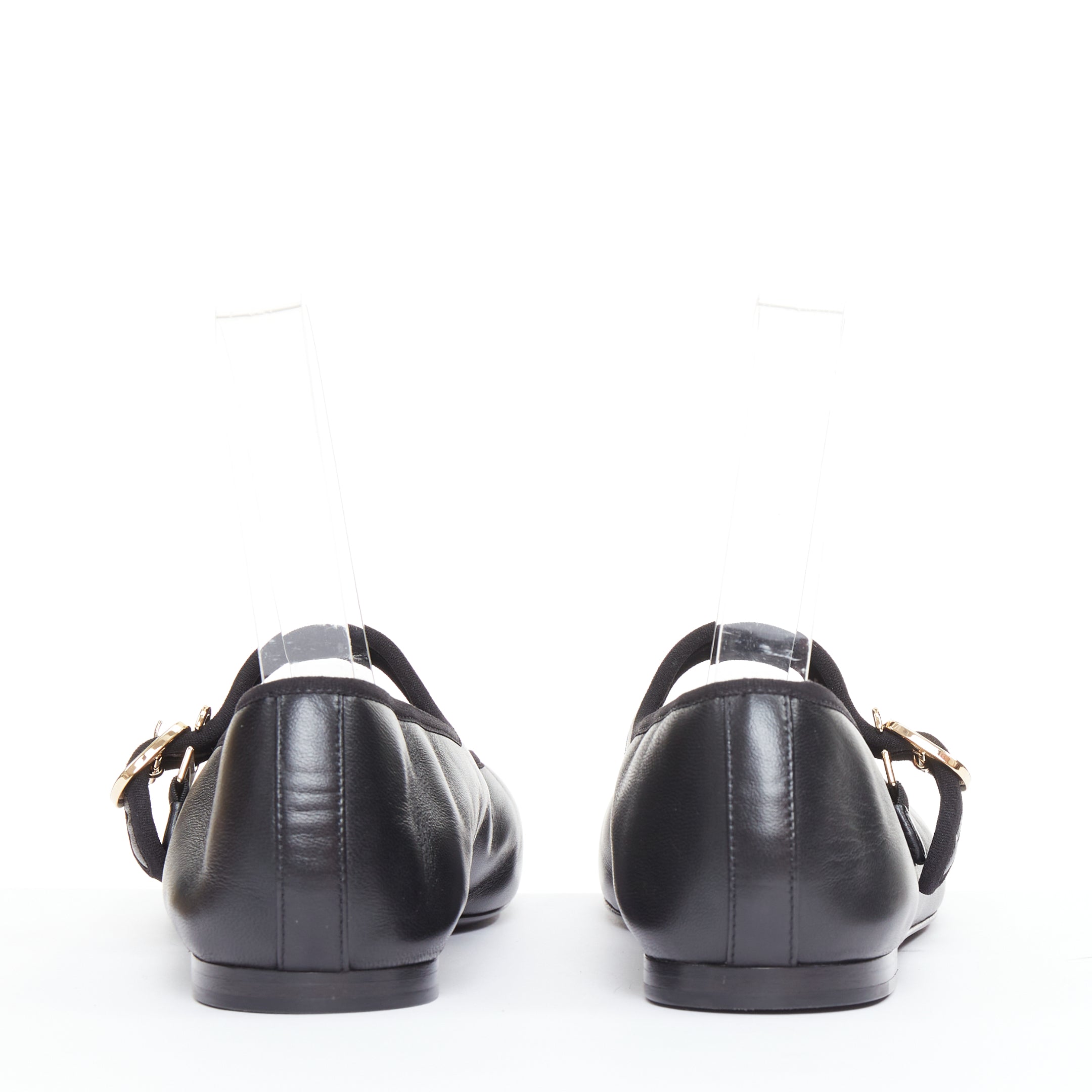 Women's Chanel black soft lambskin stitched CC cap toe flats