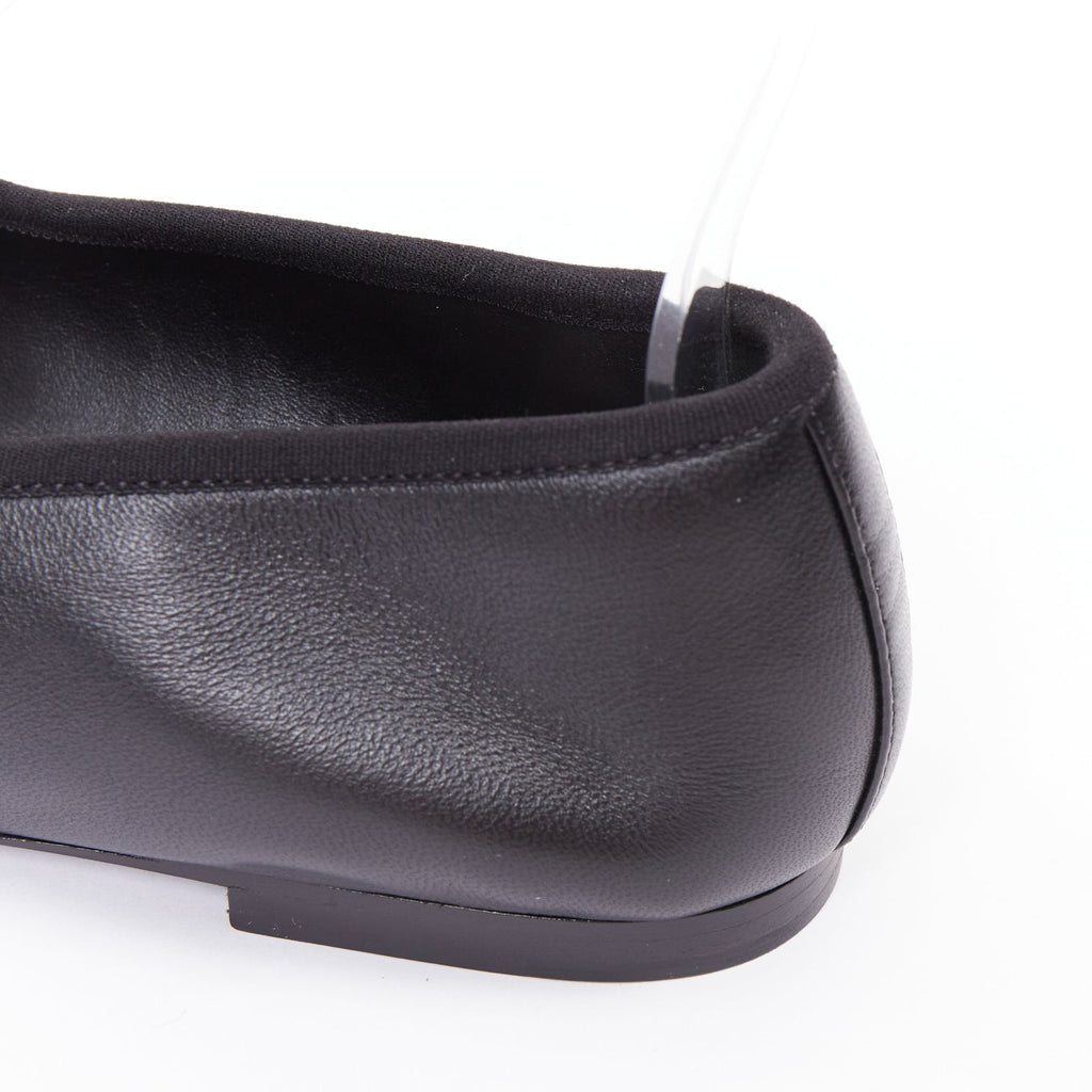 Women's Chanel black soft lambskin stitched CC cap toe flats