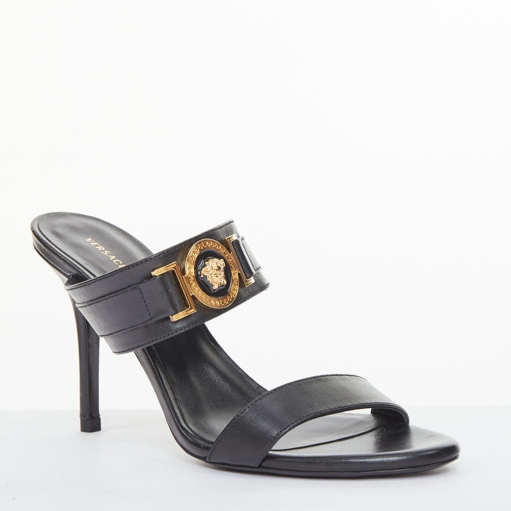 Women's Versace gold buckle black leather sandals