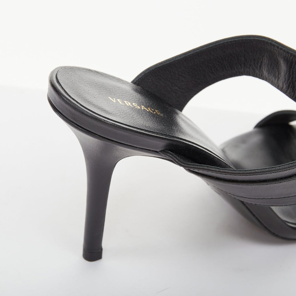 Women's Versace gold buckle black leather sandals