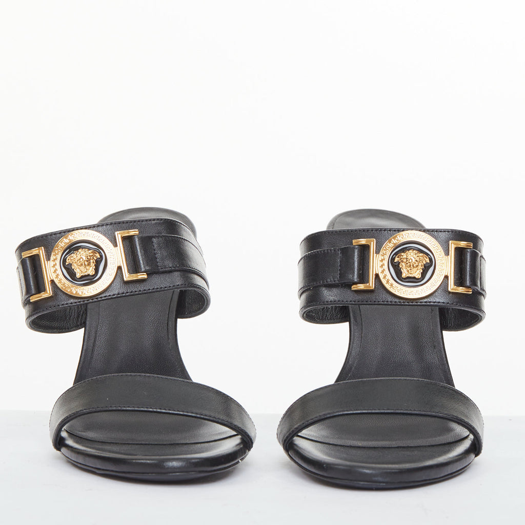 Women's Versace gold buckle black leather sandals