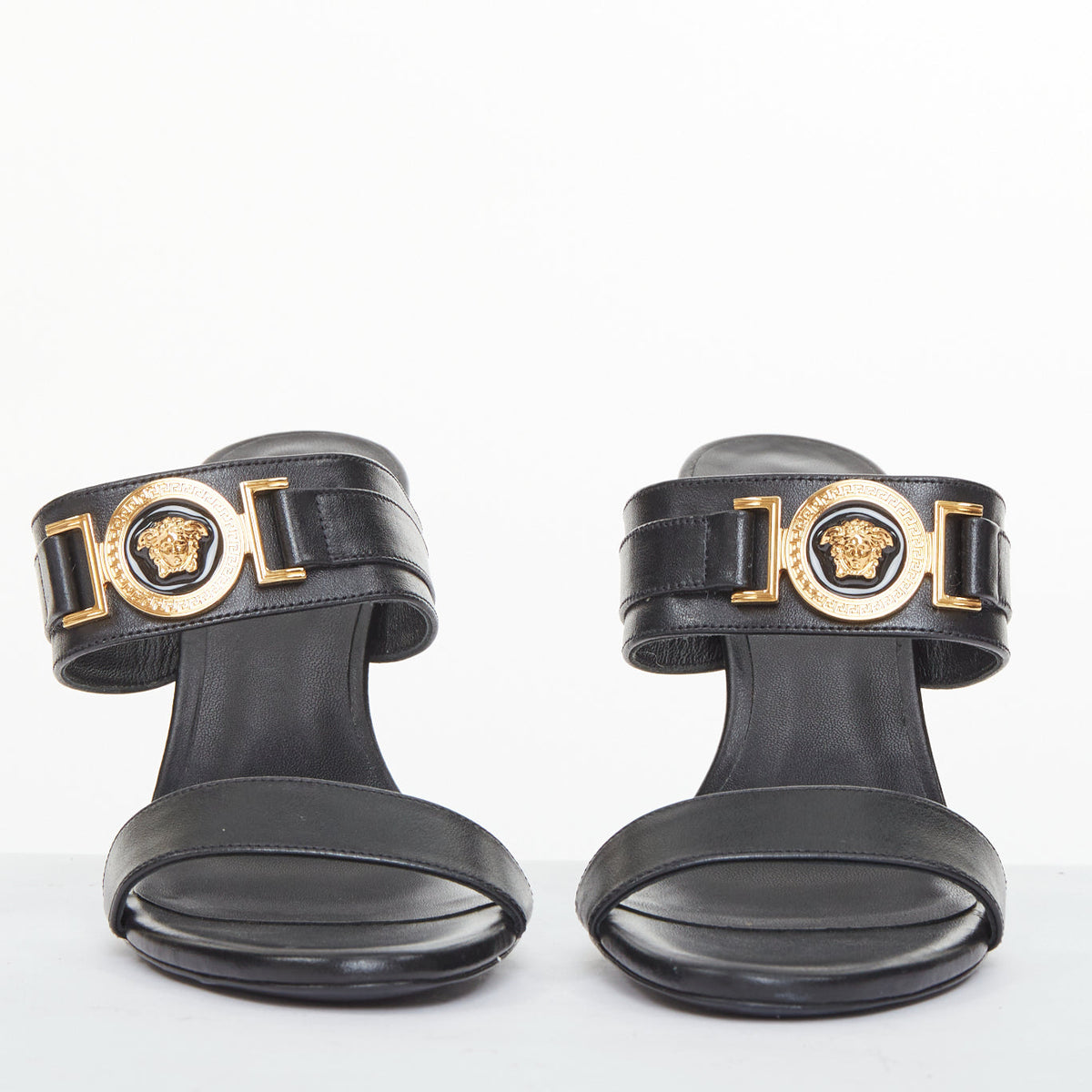 Women's Versace gold buckle black leather sandals