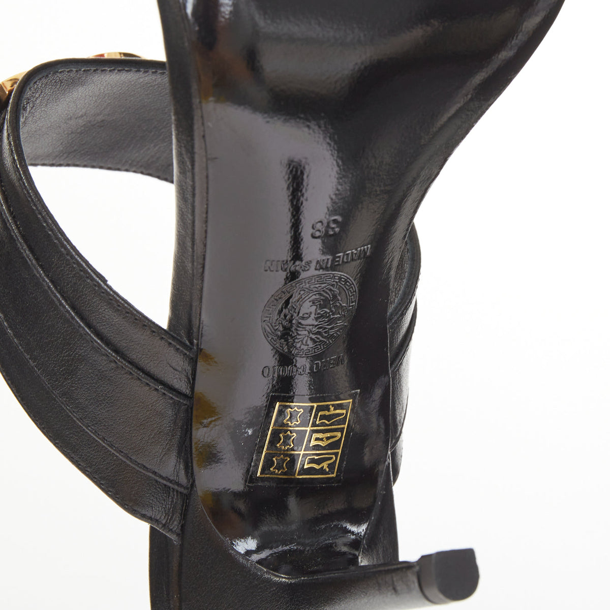 Women's Versace gold buckle black leather sandals