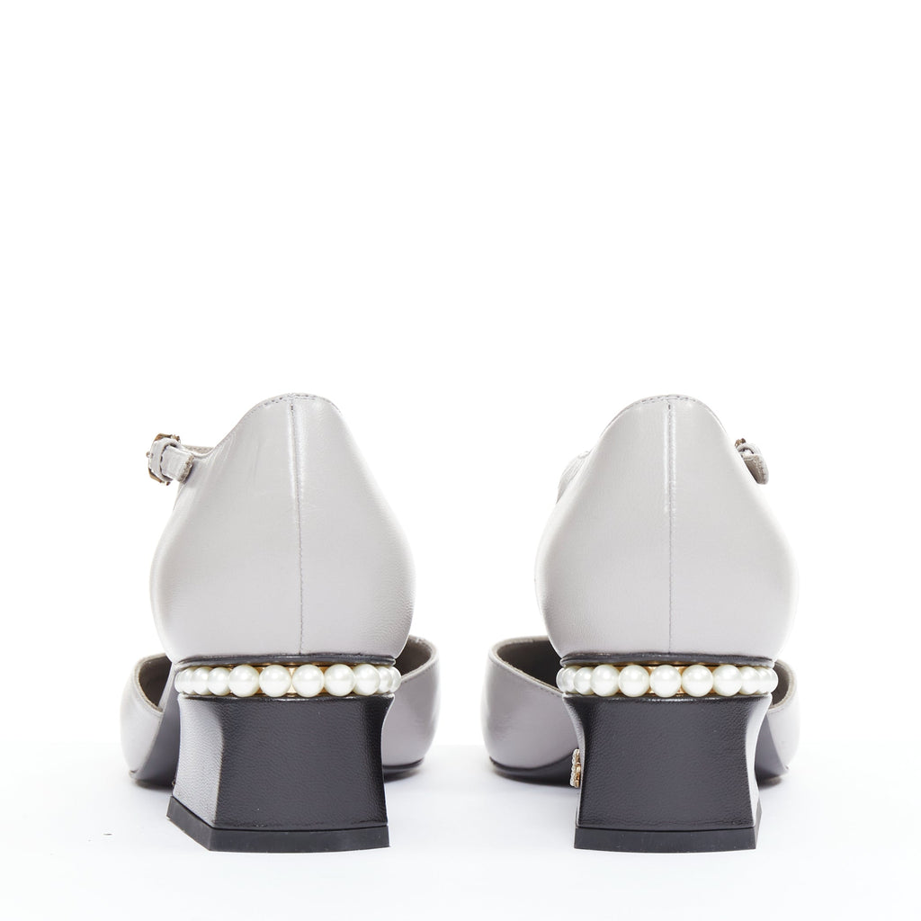 Women's Chanel grey leather pearl trimmed CC logo block heel pumps