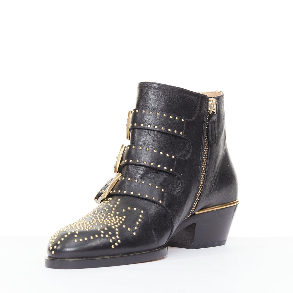Women's Chloe Susanna black leather gold floral studded triple buckle boots