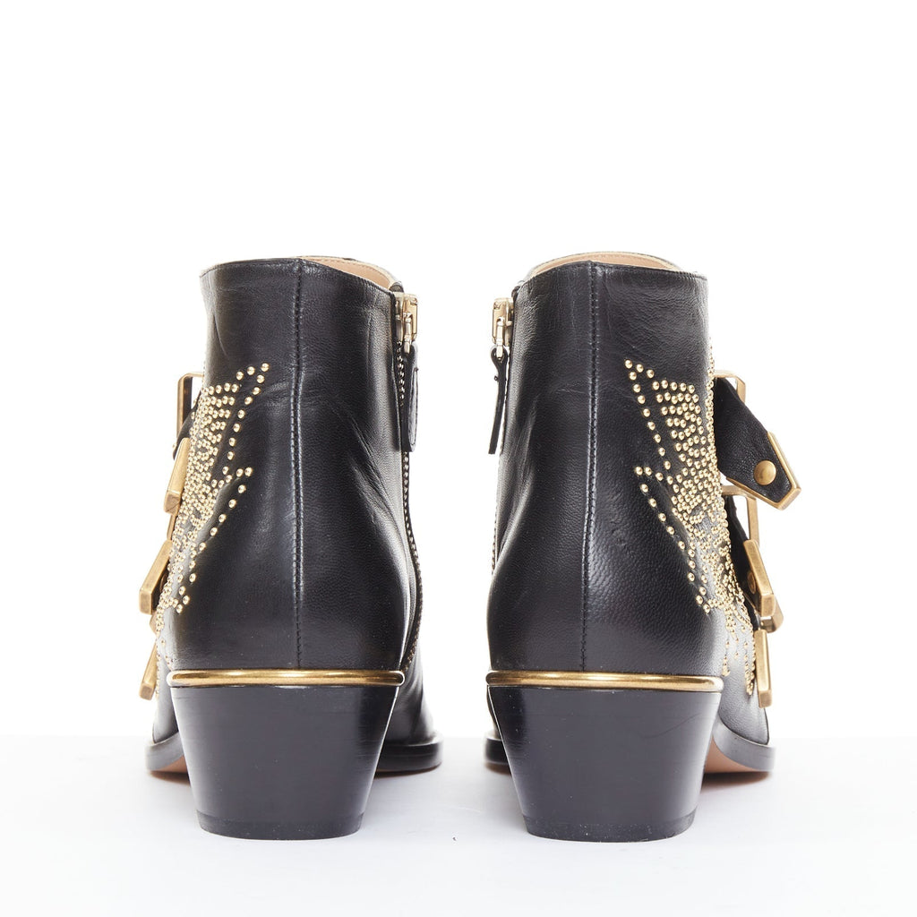 Women's Chloe Susanna black leather gold floral studded triple buckle boots