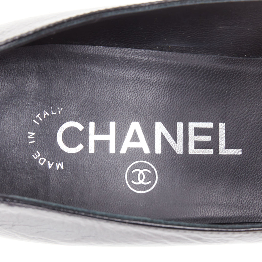 Women's Chanel Sculpted Sailor Knot black leather CC cap toe pumps
