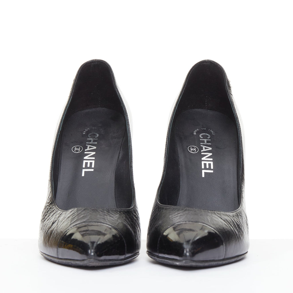 Women's Chanel Sculpted Sailor Knot black leather CC cap toe pumps