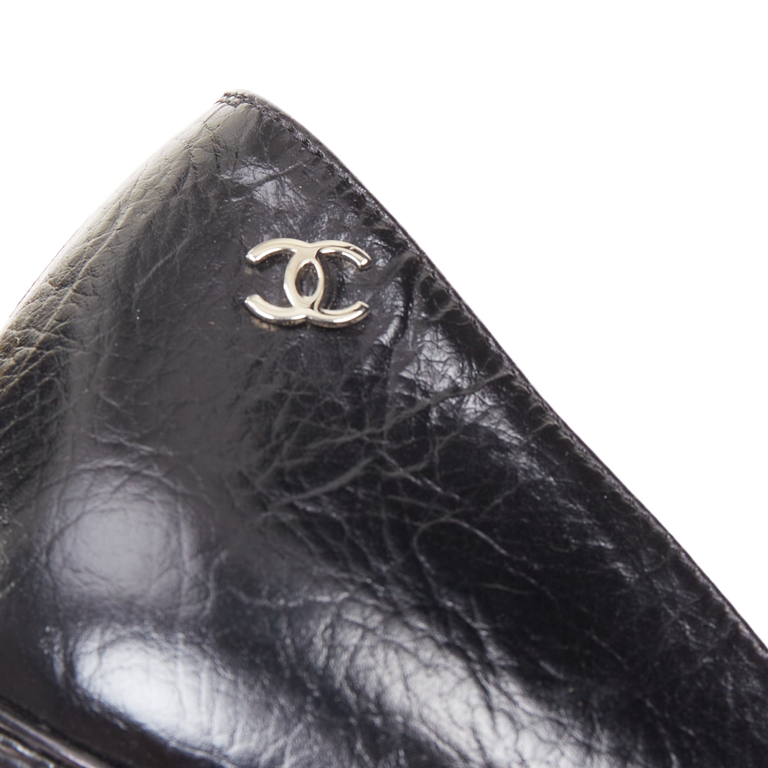 Women's Chanel Sculpted Sailor Knot black leather CC cap toe pumps