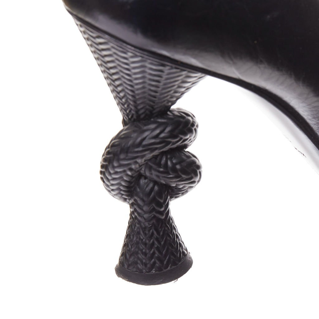 Women's Chanel Sculpted Sailor Knot black leather CC cap toe pumps