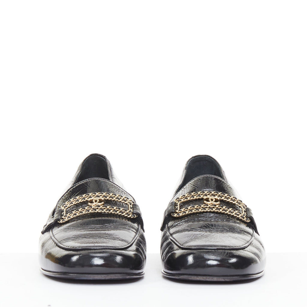 Women's Chanel black textured calfskin gold CC chain link moccasin