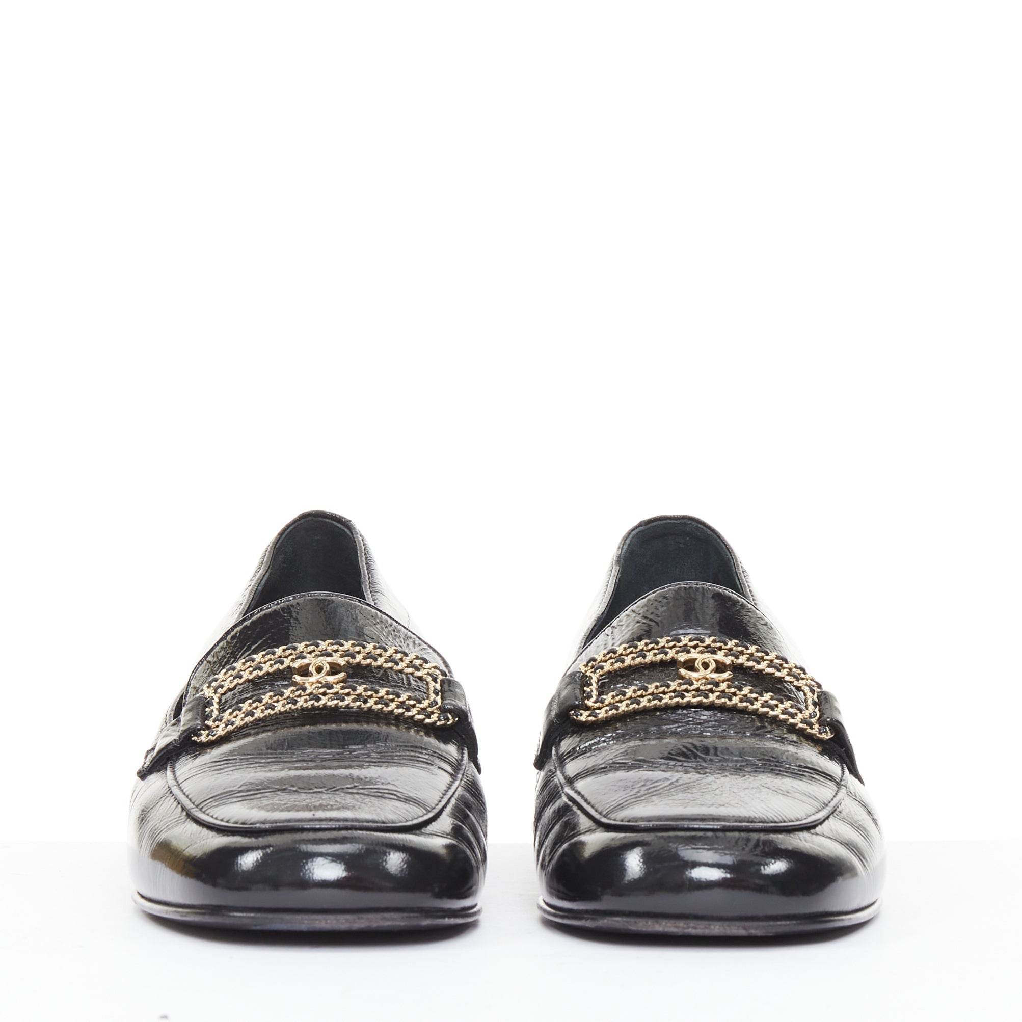 Women's Chanel black textured calfskin gold CC chain link moccasin