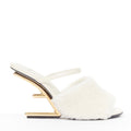 Women's Fendi First cream shearling gold F heel mule sandals