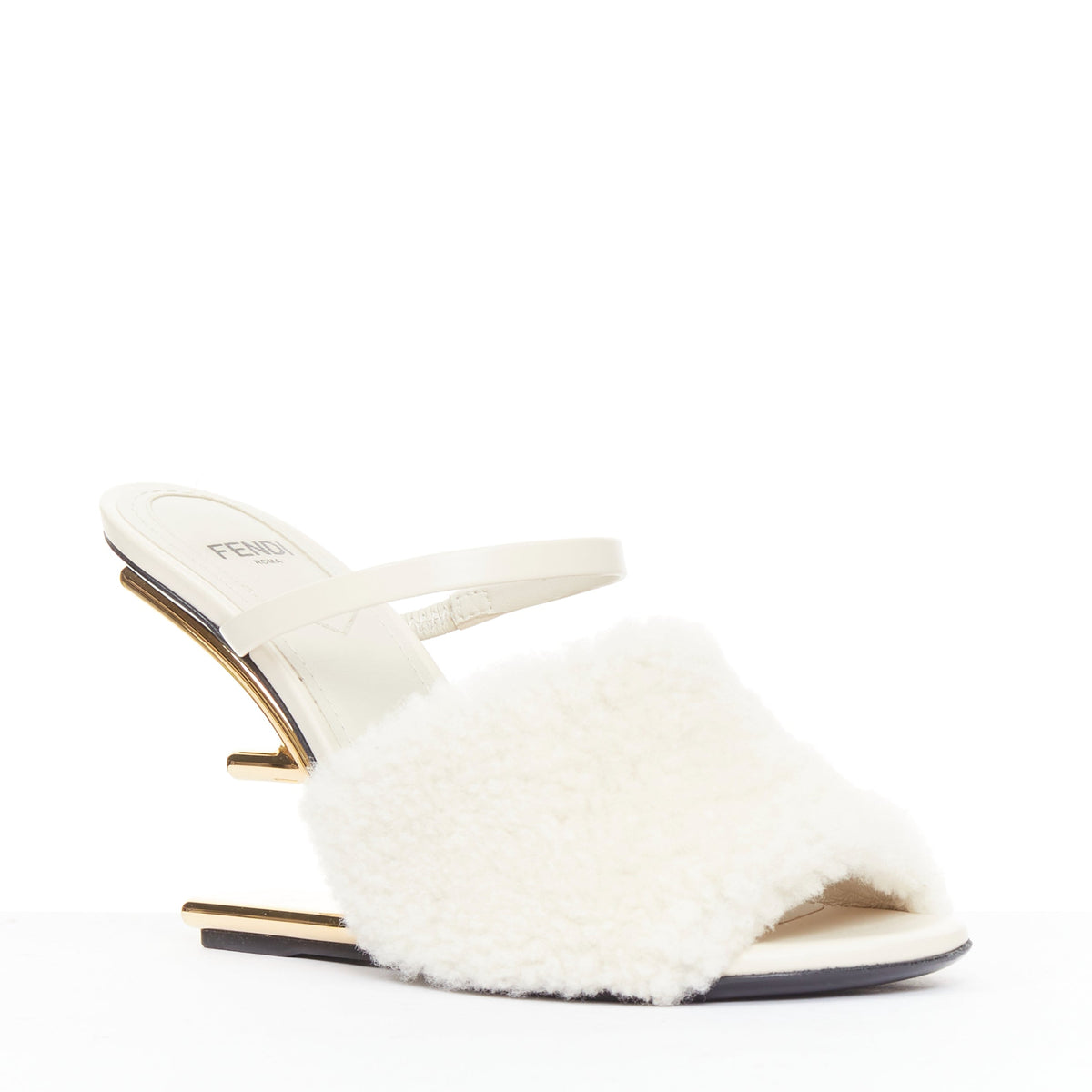 Women's Fendi First cream shearling gold F heel mule sandals