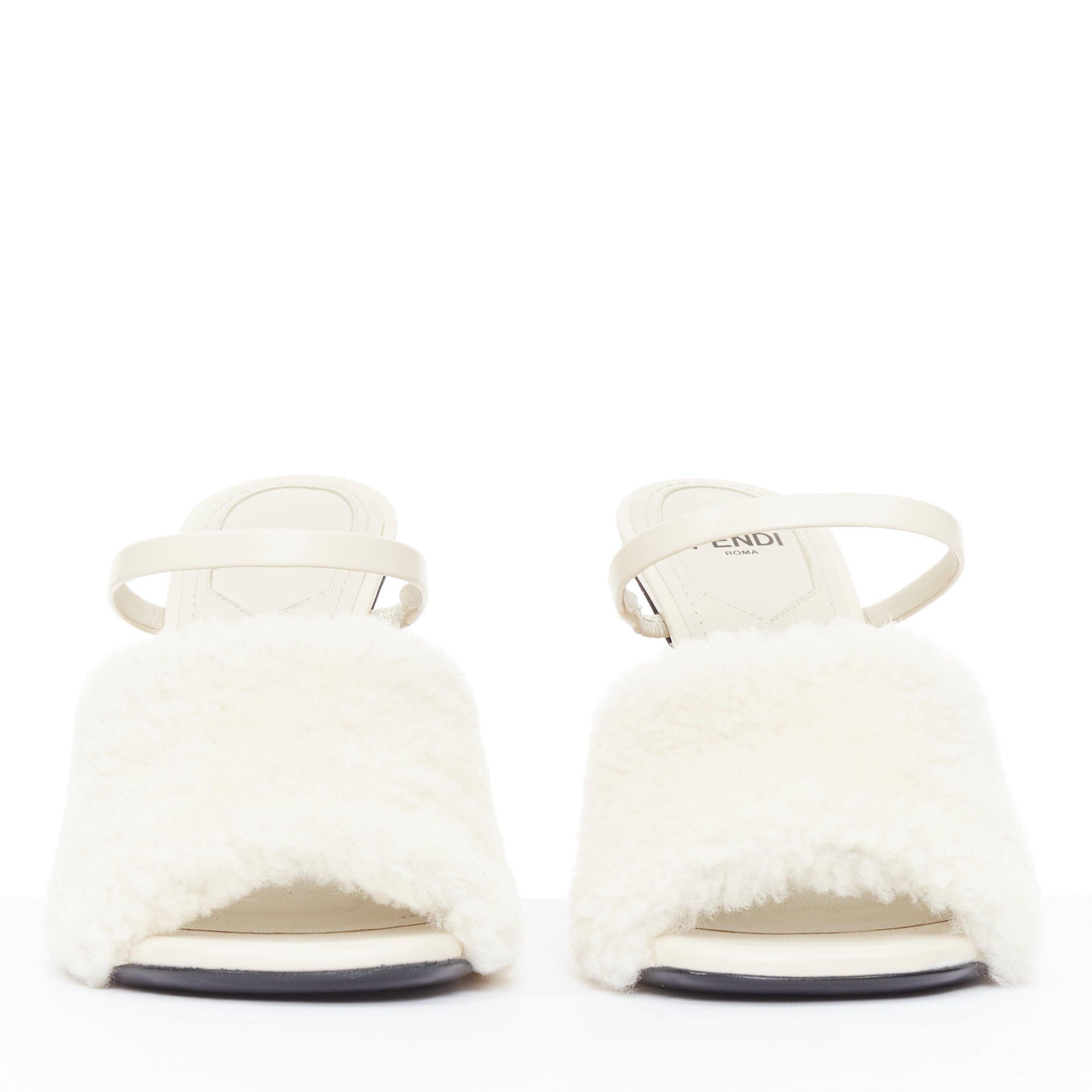 Women's Fendi First cream shearling gold F heel mule sandals