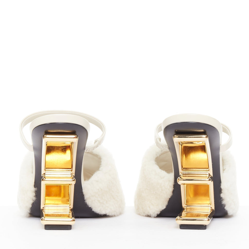 Women's Fendi First cream shearling gold F heel mule sandals