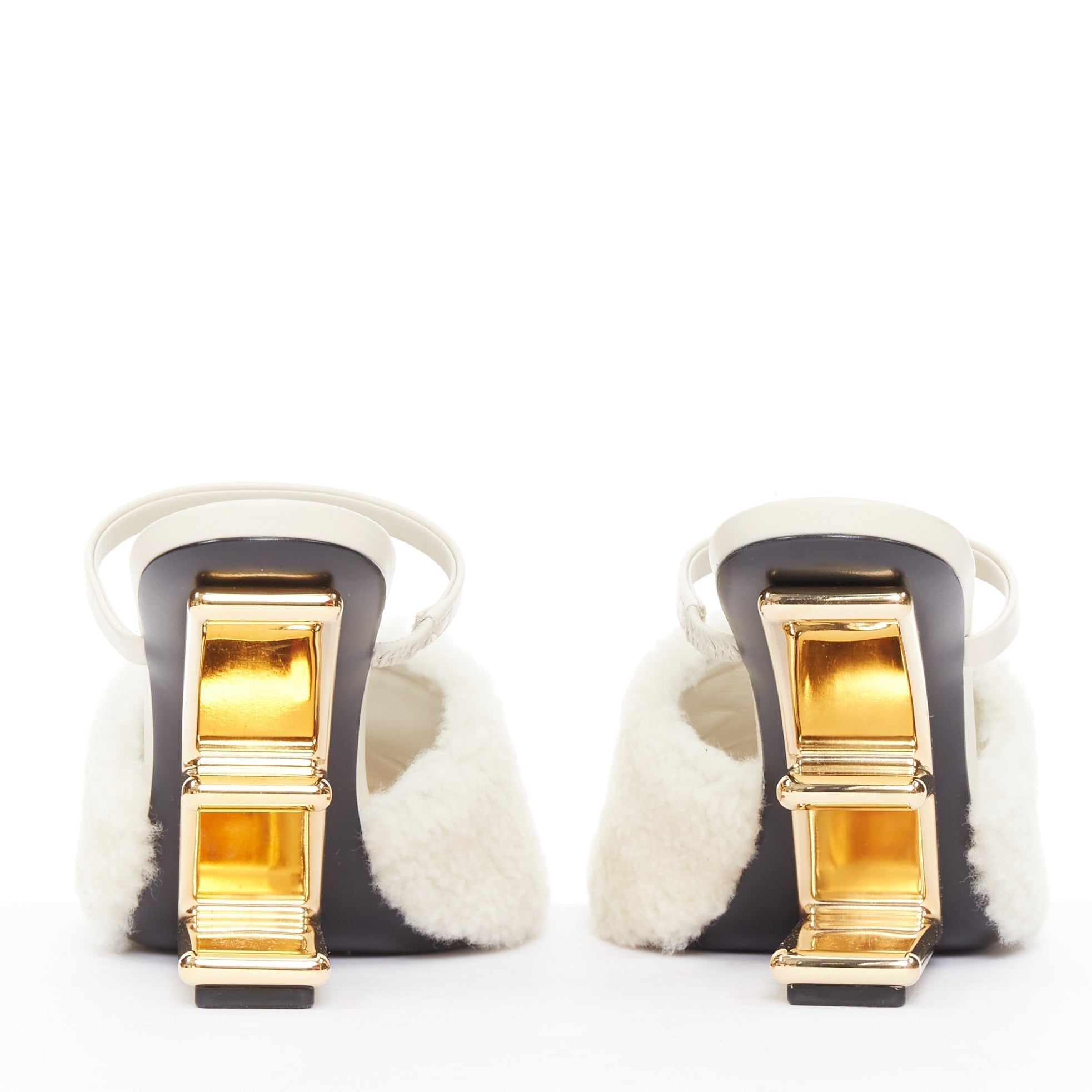 Women's Fendi First cream shearling gold F heel mule sandals
