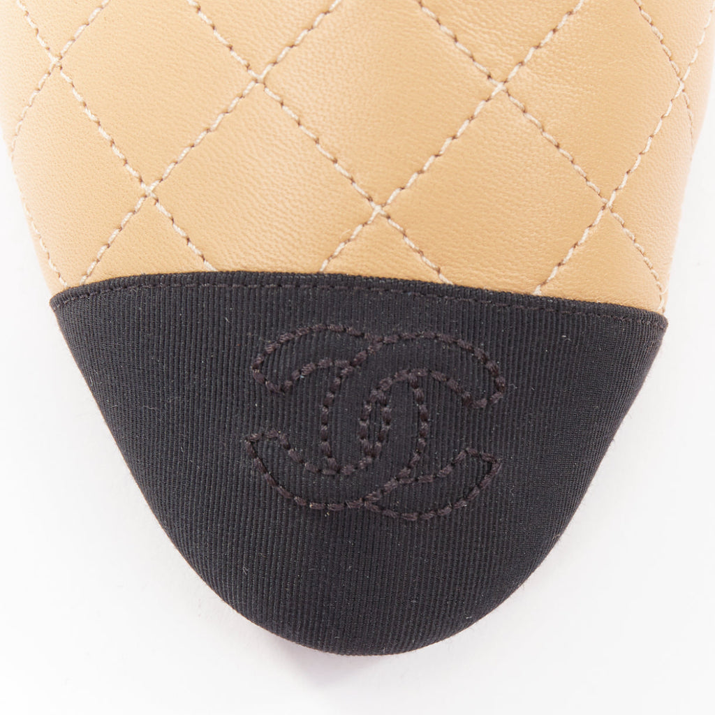 Women's Chanel nude quilted lambskin CC grosgrain cap toe pumps