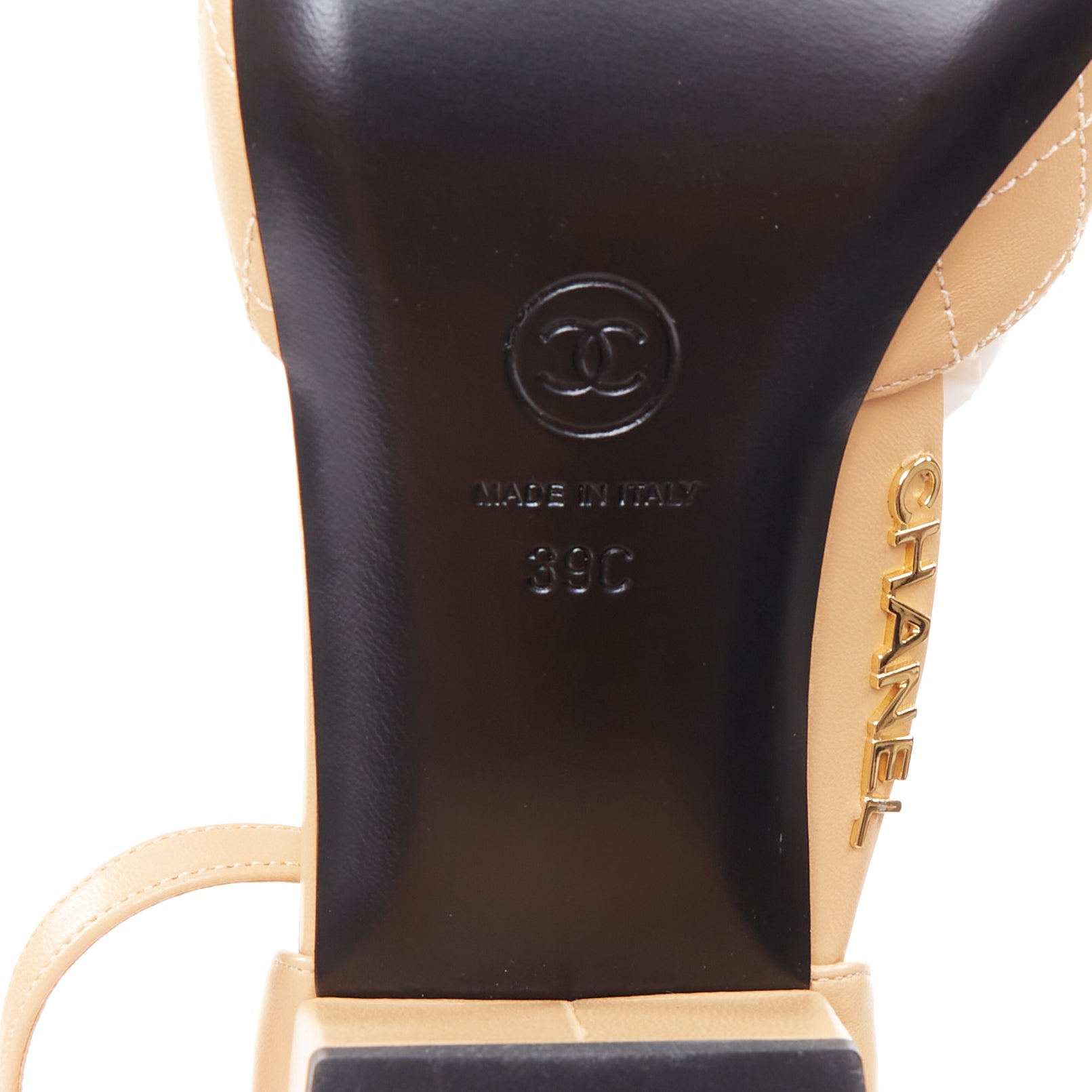 Women's Chanel nude quilted lambskin CC grosgrain cap toe pumps