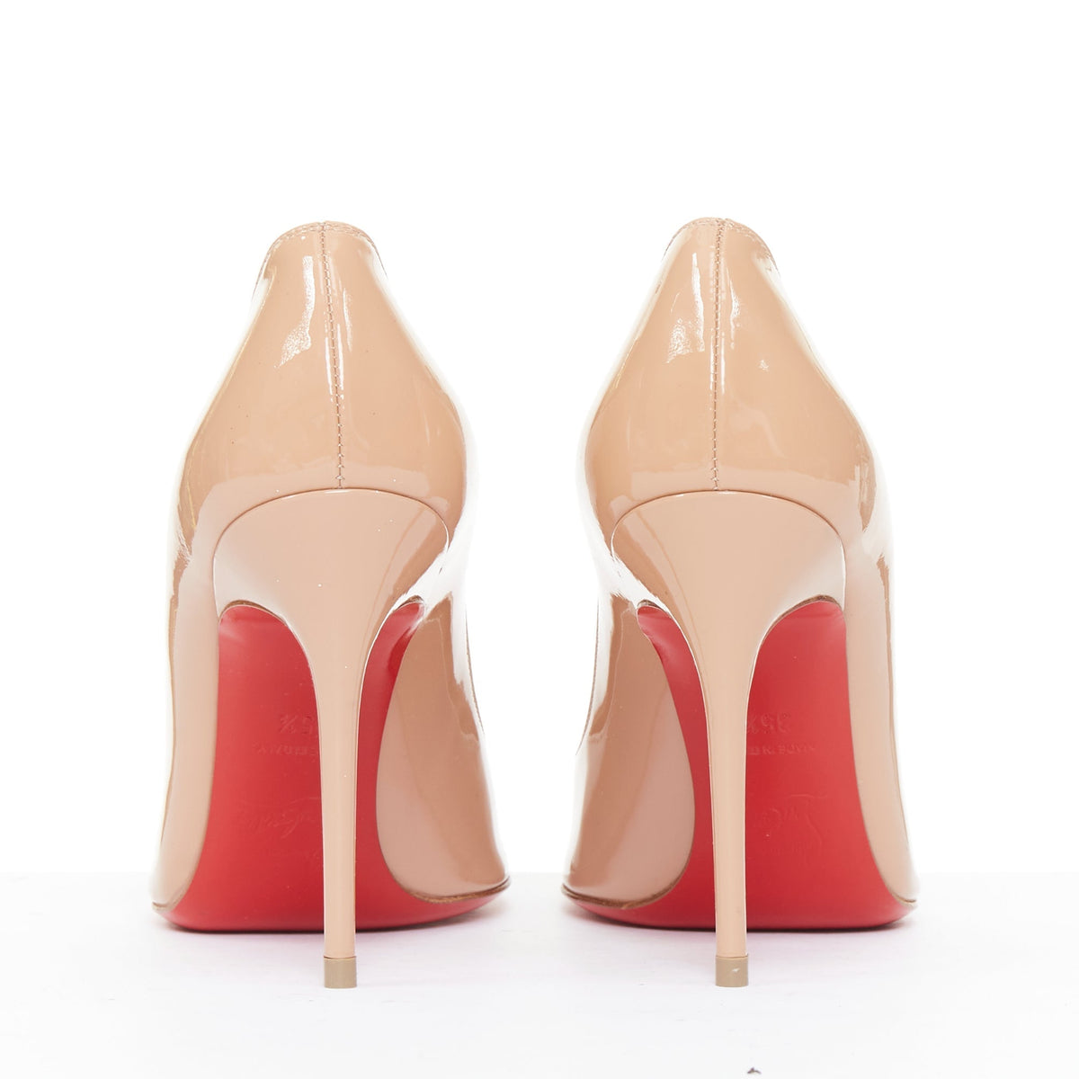 Women's Christian Louboutin Pigalle nude patent leather point toe pumps