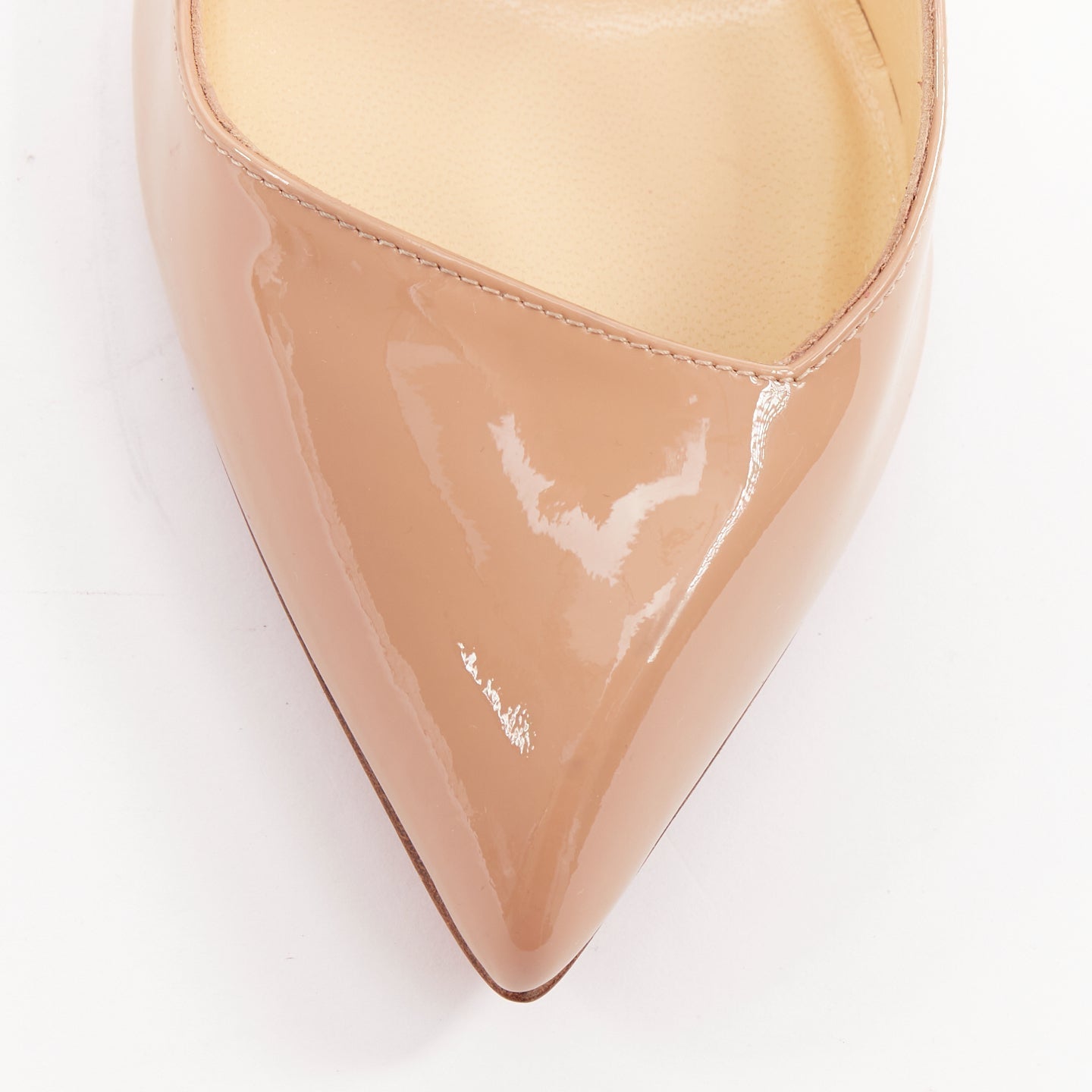 Women's Christian Louboutin Pigalle nude patent leather point toe pumps
