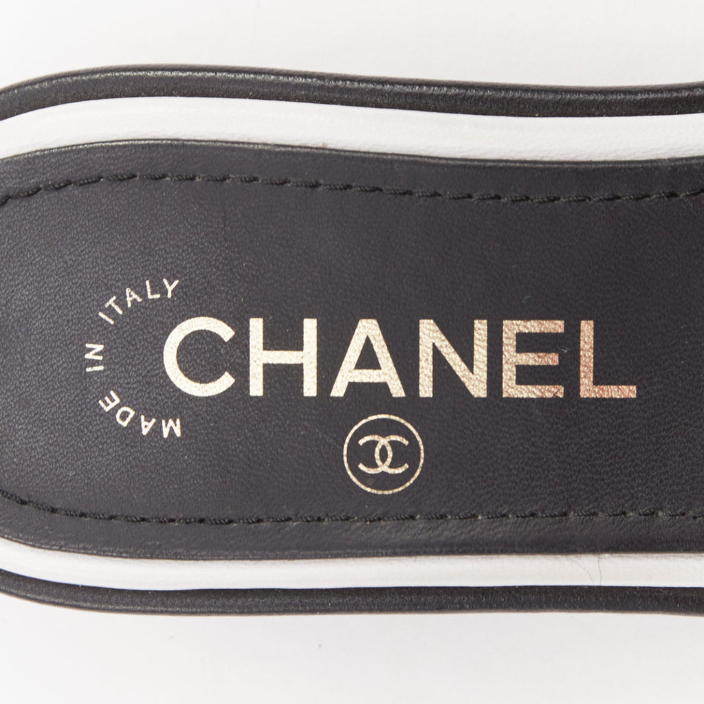 Women's Chanel black white logo embroidered lambskin heeled mules