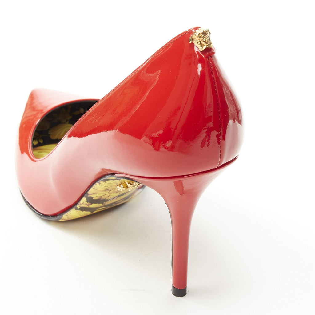Women's Versace red patent Medusa stud pumps