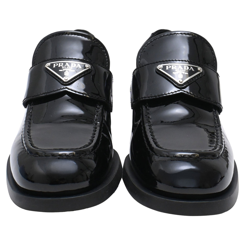 Women's Prada Triangle Logo Loafers in Black Patent Leather
