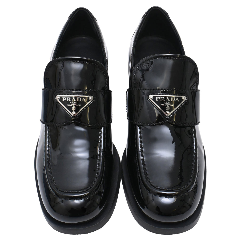Women's Prada Triangle Logo Loafers in Black Patent Leather