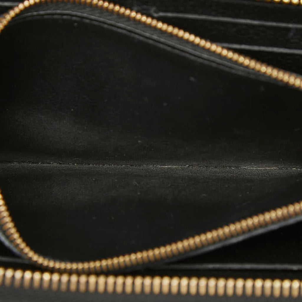 Clemence Wallet Monogram Empreinte Leather