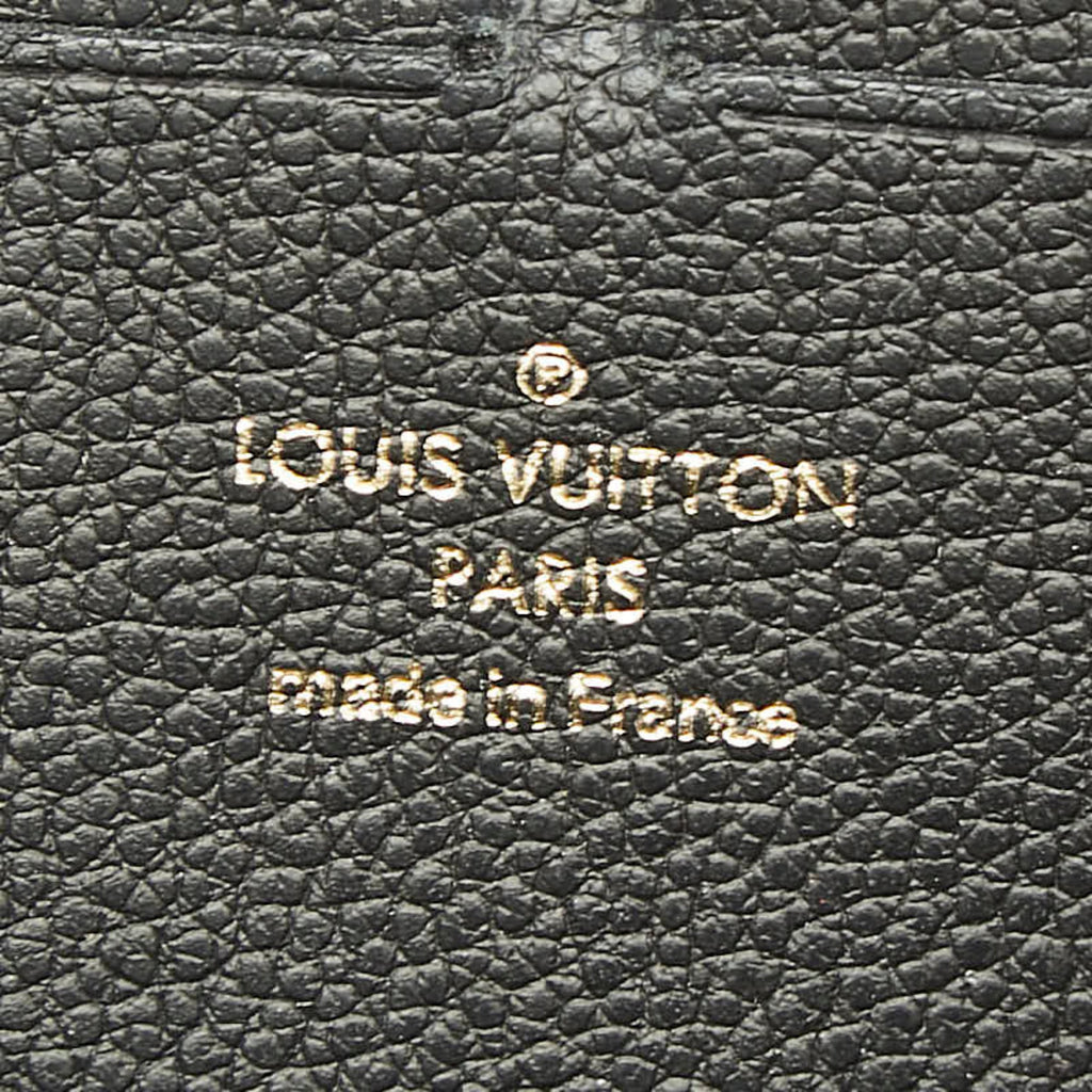 Clemence Wallet Monogram Empreinte Leather