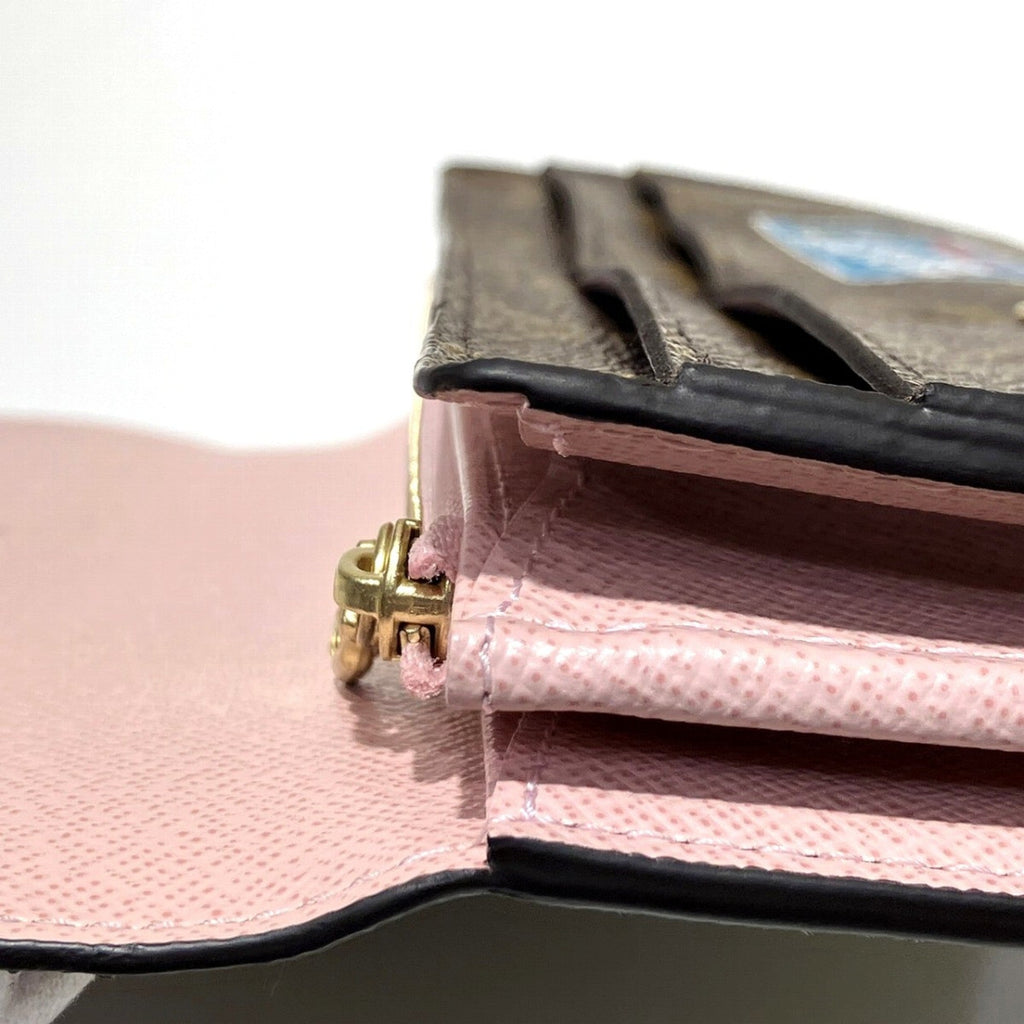 Sarah Wallet NM Limited Edition World Tour Monogram Canvas